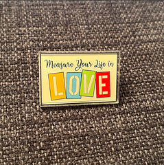 Rent “Measure Your Life in Love” – Acrylic PIN (1.5